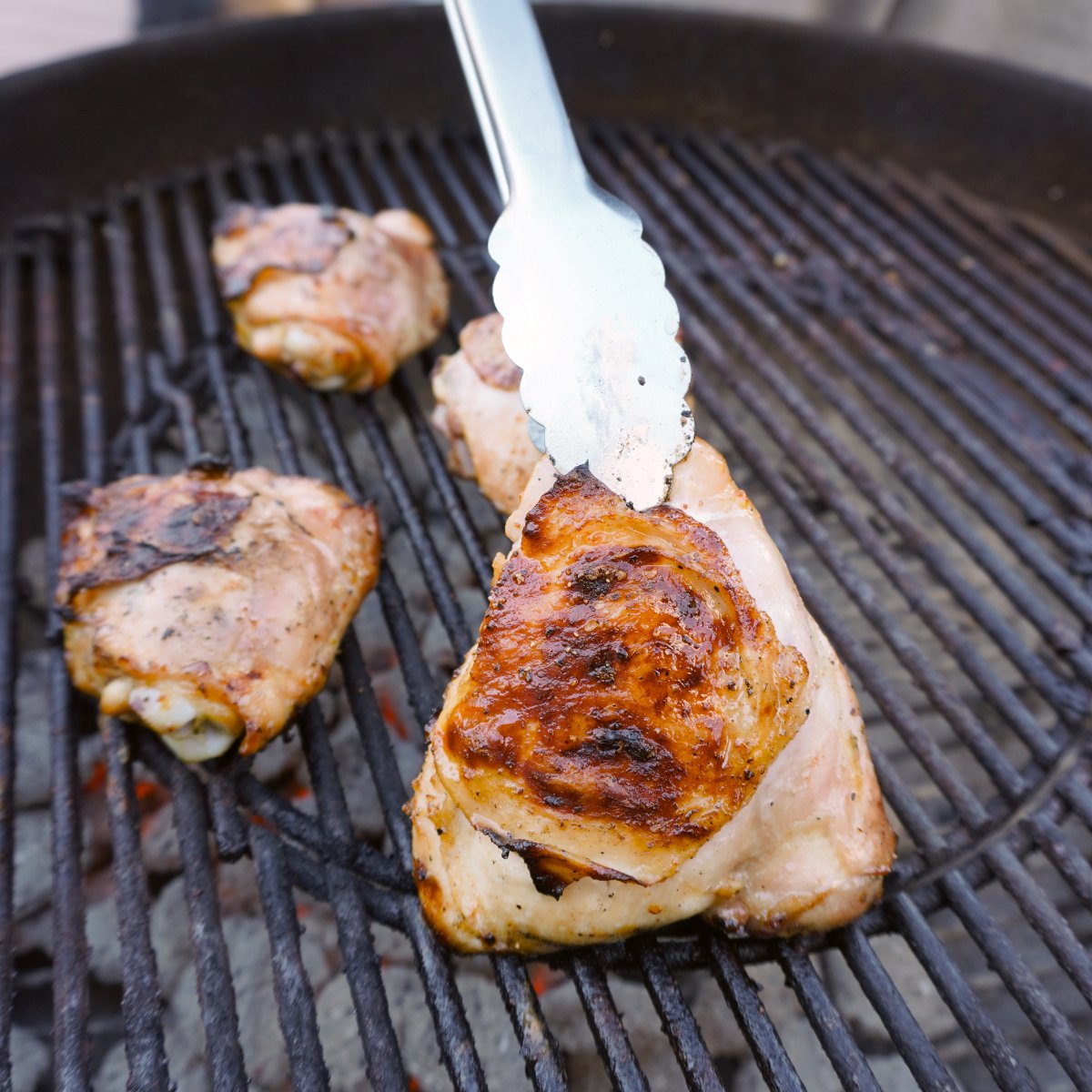 chicken thighs on the grill. 