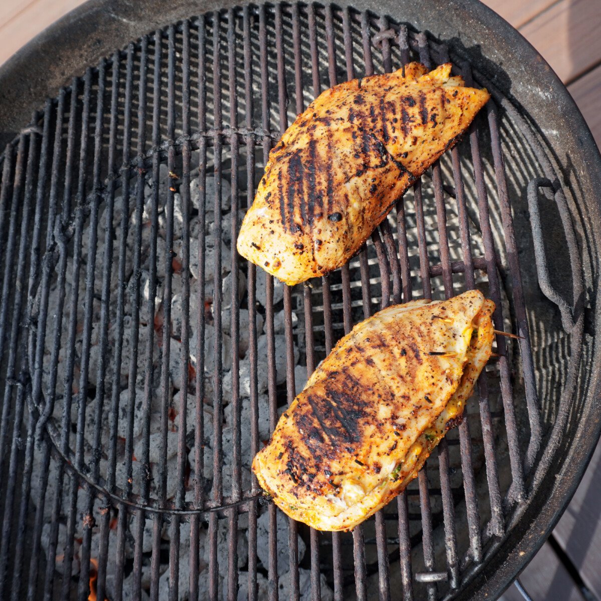 grilled chicken on a charcoal grill.